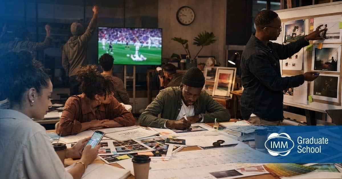 South-African-marketer-checking-world-cup-match-update-office-desk